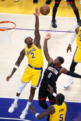 April 18, 2026, Los Angeles, California, USA: Houston RocketsÃ¢â‚¬â ¢ Aaron Holiday (0) shoots against Los Angeles LakersÃ¢â‚¬â ¢ Jarred Vanderbilt (2) during Game 1 of a first-round NBA, Basketball Herren, USA playoff series at Crypto.com Arena on Saturday, April 18, 2026 in Los Angeles. Los Angeles USA - ZUMAc68_ 20260418_zaf_c68_009 Copyright: xRingoxChiux