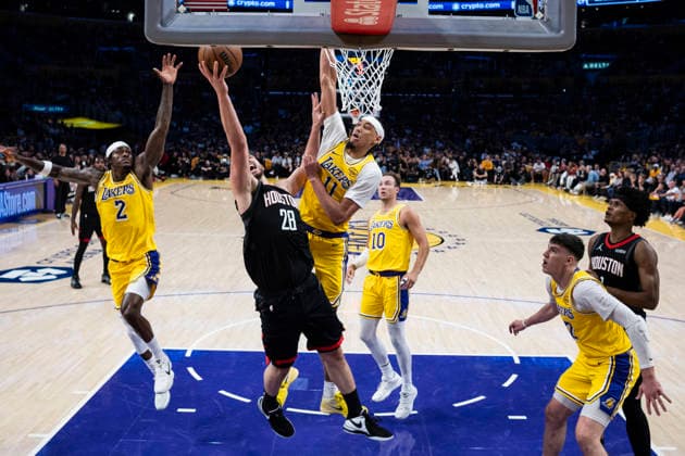 April 18, 2026, Los Angeles, California, USA: Houston RocketsÃ¢â‚¬â ¢ Clint Capela (30) goes to the basket under pressure from Los Angeles LakersÃ¢â‚¬â ¢ Jaxson Hayes (11) during Game 1 of a first-round NBA, Basketball Herren, USA playoff series at Crypto.com Arena on Saturday, April 18, 2026 in Los Angeles. Los Angeles USA - ZUMAc68_ 20260418_zaf_c68_083 Copyright: xRingoxChiux