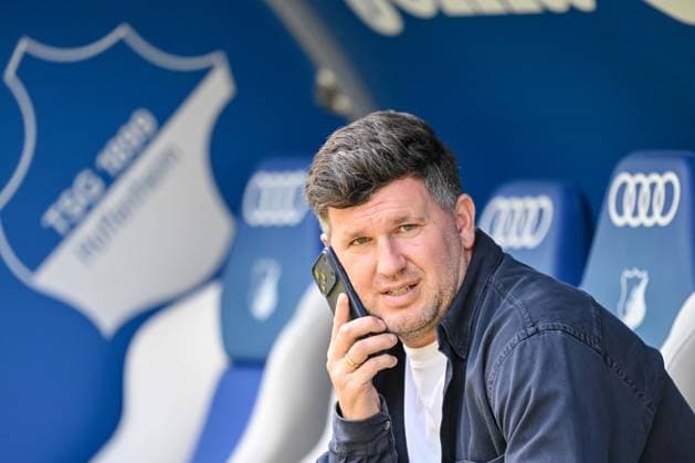 Geschäftsführer Andreas Schicker Schaut waehrend des spiels der Bundesliga zwischen TSG Hoffenheim und Borussia Dortmund, PreZero Arena am 18. April 2026 in Sinsheim, Deutschland. (Foto von Harry Langer DeFodi Images) +++ Geschäftsführer Sport Andreas Schicker Looks on during the Bundesliga match between TSG Hoffenheim and Borussia Dortmund at PreZero Arena on April 18, 2026 in Sinsheim, Germany. (Photo by Harry Langer DeFodi Images) DFL regulations prohibit any use of photographs as image sequences and or quasi-video. (Photo by Harry Langer DeFodi Images) DFL regulations prohibit any use of photographs as image sequences and or quasi-video. - *** Geschäftsführer Sport Andreas Schicker Looks on during the Bundesliga match between TSG Hoffenheim and Borussia Dortmund, PreZero Arena am 18 April 2026 in Sinsheim, Germany Photo by Harry Langer DeFodi Images Geschäftsführer Sport Andreas Schicker Looks on during the Bundesliga match between TSG Hoffenheim and Borussia Dortmund at PreZero Arena on April 18, 2026 in Sinsheim, Germany Photo by Harry Langer DeFodi Images DFL regulations prohibit any use of photographs as image sequences and or quasi video Photo by Harry Langer DeFodi Images DFL regulations prohibit any use of photographs as image sequences and or quasi video