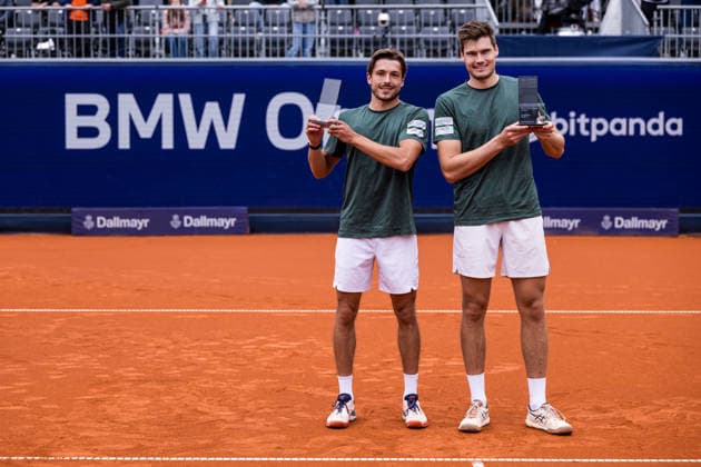 MUNICH, GERMANY - APRIL 19: Jakob Schnaitter (GER) Mark Wallner (GER) pose with the trophies during the trophy ceremony of the BMW Open by Bitpanda Doubles match between Jakob Schnaitter (GER) Mark Wallner (GER) vs Theo Arribage (FRA) Albano Olivetti (FRA) at MTTC Iphitos on April 19, 2026 in Munich, Germany. Bavaria Germany Copyright: xSteffiexWunderlx