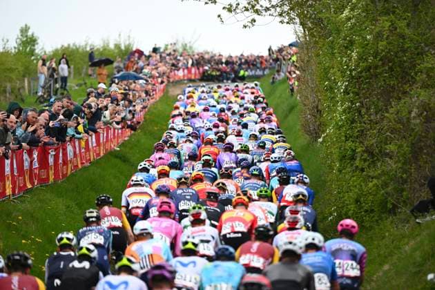 Amstel Gold Race 2026 Cycling Race VALKENBURG, THE NETHERLANDS - APRIL 19 : illustration picture peloton during the 60th edition of Amstel Gold Race an UCI World Tour 1.UWT one day cycling road race for Men Elite of 220 km with start in Maastricht and finish in Valkenburg on April 19, 2026 in Valkenburg, The Netherlands, 19 04 2026 ( Motordriver Kenny Verfaillie - Valkenburg The Netherlands  Copyright: xVincentxKalutx