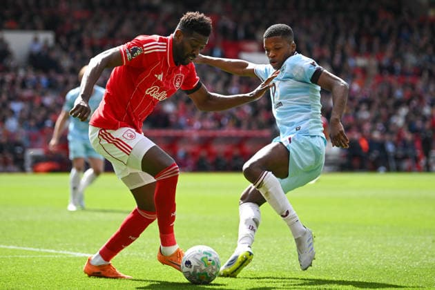 Nottingham, England, 19th April 2026. Ibrahim Sangare of Nottingham Forest jostles for the ball against Florentino of Burnley during the Nottingham Forest vs Burnley Premier League match at the City Ground, Nottingham. Picture credit should read: Harriet Massey Sportimage EDITORIAL USE ONLY. No use with unauthorised audio, video, data, fixture lists, club league logos or live services. Online in-match use limited to 120 images, no video emulation. No use in betting, games or single club league player publications. SPI_049_FOREST_V_BURNLEY SPI-4702-0046