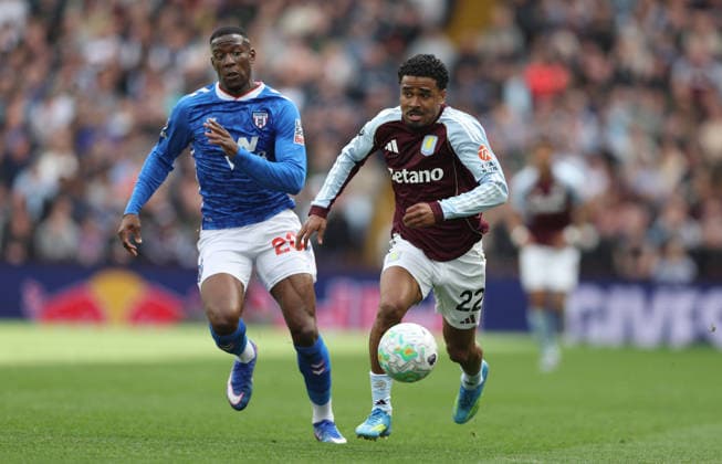 Ian Maatsen of Aston Villa and Nordi Mukiele of Sunderland in action Aston Villa v Sunderland, Premier League, Football, Villa Park, Birmingham, UK - 19 Apr 2026Birmingham Villa Park United Kingdom EDITORIAL USE ONLY No use with unauthorised audio, video, data, fixture lists, club league logos or live services. Online in-match use limited to 120 images, no video emulation. No use in betting, games or single club league player publications. Copyright: xKieranxMcManus Shutterstockx 16832205aa