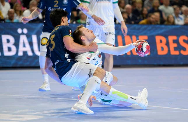 (l-r) Eloy MORANTE MALDONADO (BHC), Mathias GIDSEL (B) Zweikampf, Aktion. Finale Füchse Berlin (B) - Bergischer HC (BHC), am 19.04.2026. Handball DHB Pokal Final4 2026, vom 18.04 - 19.04.2026 in Koeln Deutschland. Â