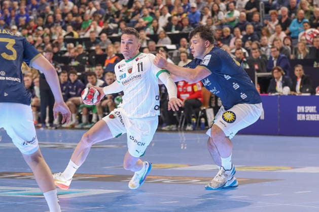 19.04.2026 ,xgox, Handball - DHB Pokal Finale Füchse Berlin - Bergischer HC emspor, v.l. Lasse Andersson (Berlin, 11), Aron Seesing (Bergischer HC, 49) Zweikampf, Duell, Kampf, tackle Koeln