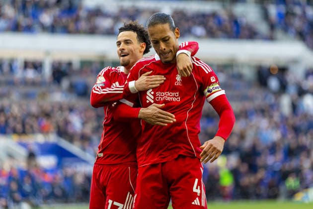 Football - FA Premier League - Everton FC v Liverpool FC LIVERPOOL, ENGLAND - Sunday, April 19, 2026: Liverpool s captain Virgil van Dijk kisses the badge as he celebrates with team-mate Curtis Jones (L) after scoring his side s second goal during the FA Premier League match between Everton FC and Liverpool FC, the 248th Merseyside Derby, at Bramley-Moore Dock. (Photo by David Rawcliffe Propaganda) LIVERPOOL Bramley-Moore Dock MERSEYSIDE ENGLAND  Copyright: xDavidxRawcliffex P2026-04-19-Everton_Liverpool-150