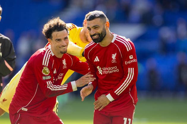 Football - FA Premier League - Everton FC v Liverpool FC LIVERPOOL, ENGLAND - Sunday, April 19, 2026: Liverpool s Curtis Jones pushes team-mate Mohamed Salah (L) to celebrate in front of the travelling supporter after the FA Premier League match between Everton FC and Liverpool FC, the 248th Merseyside Derby, at Bramley-Moore Dock. Liverpool won 2-1. (Photo by David Rawcliffe Propaganda) LIVERPOOL Bramley-Moore Dock MERSEYSIDE ENGLAND  Copyright: xDavidxRawcliffex P2026-04-19-Everton_Liverpool-165