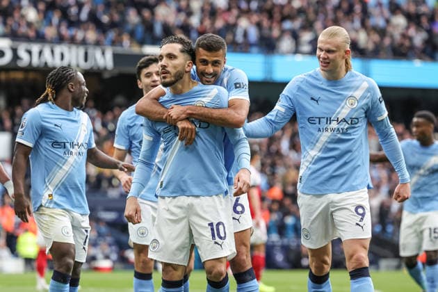 Premier League: Manchester City v Arsenal Rayan Cherki of Manchester City celebrates his goal to make it 1-0 during the Premier League match Manchester City vs Arsenal at Etihad Stadium, Manchester, United Kingdom on 19 April 2026 (Photo by Mark Cosgrove News Images) Manchester Etihad Stadium Greater Manchester United, ManU Kingdom Copyright: xMarkxCosgrove NewsxImagesx