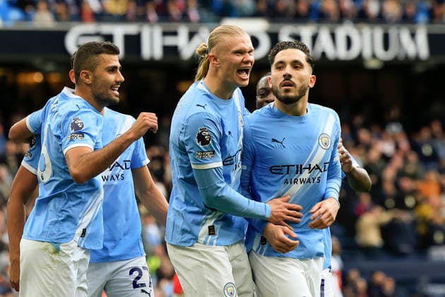 Manchester City v Arsenal, Premier League Rayan Cherki (10) of Manchester City celebrates scoring to make it 1-0 with Erling Haaland (9) of Manchester City during the Premier League match between Manchester City and Arsenal at the Etihad Stadium, Manchester, UK on 19 April 2026. Manchester Etihad Stadium Manchester UK Editorial use only DataCo restrictions apply See www.football-dataco.com , Copyright: xConorxMolloyx PSI-24102-0039