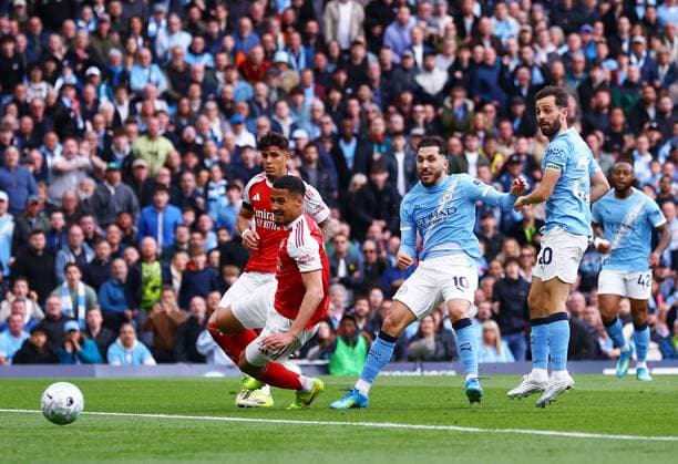 Rayan Cherki of Manchester City scores the opening goal Manchester City v Arsenal, Premier League, Football, Etihad Stadium, Manchester, UK - 19 Apr 2026Manchester Etihad Stadium United Kingdom EDITORIAL USE ONLY No use with unauthorised audio, video, data, fixture lists, club league logos or live services. Online in-match use limited to 120 images, no video emulation. No use in betting, games or single club league player publications. Copyright: xMattxWest Shutterstockx 16836204s