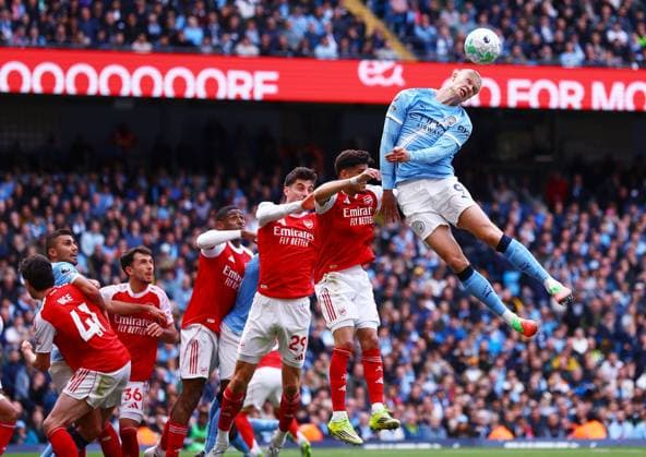 Erling Haaland of Manchester City wins a header Manchester City v Arsenal, Premier League, Football, Etihad Stadium, Manchester, UK - 19 Apr 2026Manchester Etihad Stadium United Kingdom EDITORIAL USE ONLY No use with unauthorised audio, video, data, fixture lists, club league logos or live services. Online in-match use limited to 120 images, no video emulation. No use in betting, games or single club league player publications.  Copyright: xMattxWest Shutterstockx 16836204w