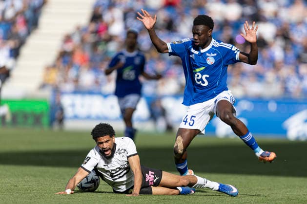 FOOTBALL : Racing de Strasbourg - Stade Rennes F. C - Ligue 1 - Stade de la Meinau - 19 04 2026 Cisse Amadou 45 Racing de Strasbourg et Mahdi Camara 45 Stade Rennes F. C  Copyright: xelyxandroxcegarrax