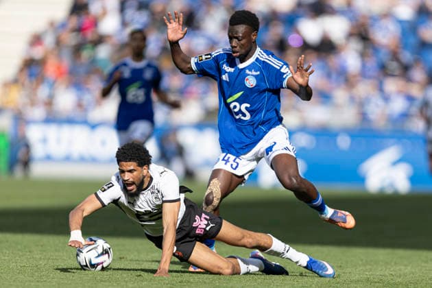 FOOTBALL : Racing de Strasbourg - Stade Rennes F. C - Ligue 1 - Stade de la Meinau - 19 04 2026 Cisse Amadou 45 Racing de Strasbourg et Mahdi Camara 45 Stade Rennes F. C  Copyright: xelyxandroxcegarrax