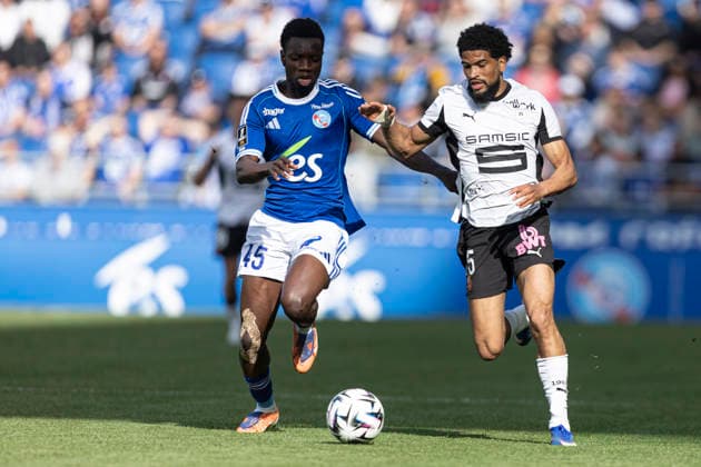FOOTBALL : Racing de Strasbourg - Stade Rennes F. C - Ligue 1 - Stade de la Meinau - 19 04 2026 Cisse Amadou 45 Racing de Strasbourg et Mahdi Camara 45 Stade Rennes F. C  Copyright: xelyxandroxcegarrax
