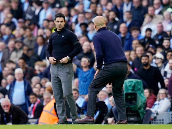 Manchester, England, 19th April 2026. Mikel Arteta manager of Arsenal smiles as Pep Guardiola coach of Manchester City reacts to a decision during the Manchester City vs Arsenal Premier League match at the Etihad Stadium, Manchester. Picture credit should read: Andrew Yates Sportimage EDITORIAL USE ONLY. No use with unauthorised audio, video, data, fixture lists, club league logos or live services. Online in-match use limited to 120 images, no video emulation. No use in betting, games or single club league player publications. SPI_067_AY_Man_City_Arsenal SPI-4704-0066