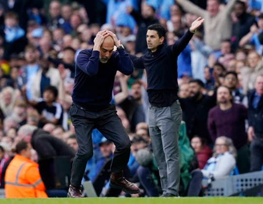 Manchester, England, 19th April 2026. Pep Guardiola coach of Manchester City reacts in front of Mikel Arteta manager of Arsenal during the Manchester City vs Arsenal Premier League match at the Etihad Stadium, Manchester. Picture credit should read: Andrew Yates Sportimage EDITORIAL USE ONLY. No use with unauthorised audio, video, data, fixture lists, club league logos or live services. Online in-match use limited to 120 images, no video emulation. No use in betting, games or single club league player publications. SPI_071_AY_Man_City_Arsenal SPI-4704-0068