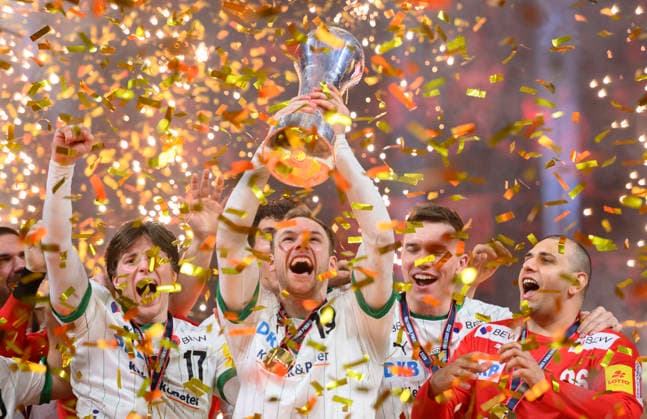 Siegerehrung, Jubel Mathias GIDSEL (B) mit dem DHB Pokal, (l-r) Nils LICHTLEIN (B), Mathias GIDSEL (B), Torwart Dejan MILOSAVLJEV (B). Finale Füchse Berlin (B) - Bergischer HC (BHC), am 19.04.2026. Handball DHB Pokal Final4 2026, vom 18.04 - 19.04.2026 in Koeln Deutschland. Â