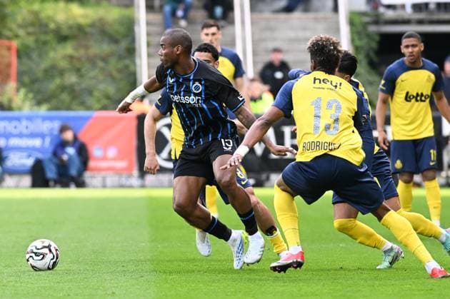Club s Raphael Onyedika and Union s Kevin Rodriguez pictured in action during a soccer match between Royale Union Saint-Gilloise and Club Brugge, Sunday 19 April 2026 in Brussels, on the third day of the Champion s Play-offs (PO1) of the 2025-2026 Jupiler Pro League first division of the Belgian championship. JILLxDELSAUX  x171355198x