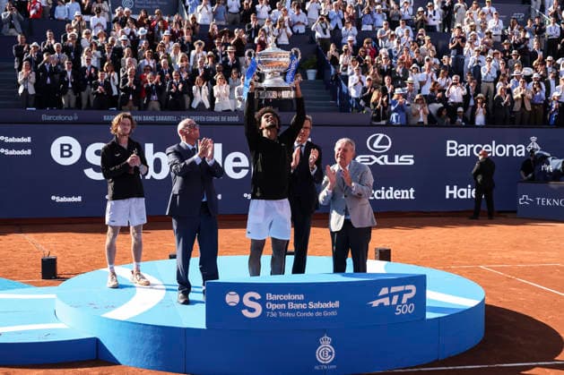 April 19, 2026, Barcelona, Barcelona, Spain: Arthur Fils of France celebrates with the championship trophy during the Final tennis match of the Barcelona Open Banc Sabadell - Conde Godo 2026 Day 9 at Real Club de Tenis Barcelona on April 19, 2026 in Barcelona, Spain. Barcelona Open Banc Sabadell - Conde Godo 2026 Day 9  - ZUMAa181 20260419_zaa_a181_110 Copyright: xJavierxBorregox