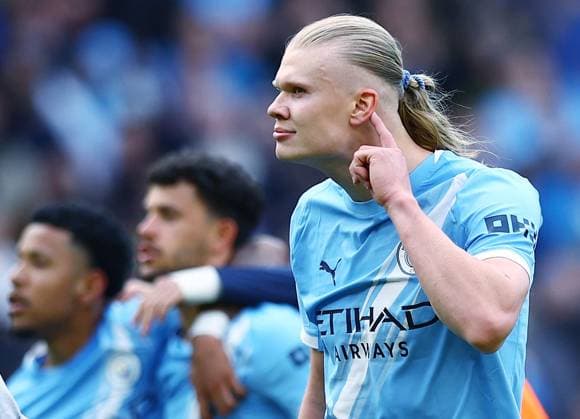 Erling Haaland of Manchester City gestures to listen at the end of the match Manchester City v Arsenal, Premier League, Football, Etihad Stadium, Manchester, UK - 19 Apr 2026Manchester Etihad Stadium United Kingdom EDITORIAL USE ONLY No use with unauthorised audio, video, data, fixture lists, club league logos or live services. Online in-match use limited to 120 images, no video emulation. No use in betting, games or single club league player publications. Copyright: xMattxWest Shutterstockx 16836204at