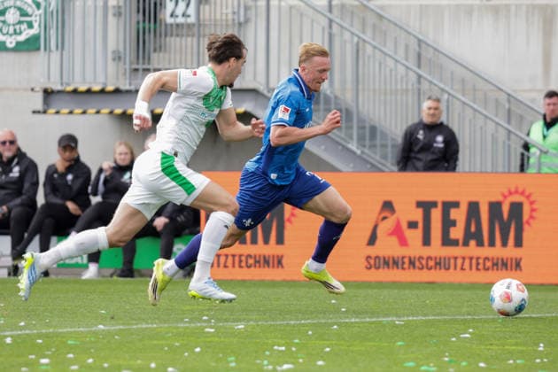 19.04.2026, xgrfx, Fussball 2.Bundesliga, SpVgg Greuther Fuerth - SV Darmstadt 98 v.l. Reno Münz (Greuther Fürth), Isac Lidberg (SV Darmstadt) (DFL DFB REGULATIONS PROHIBIT ANY USE OF PHOTOGRAPHS as IMAGE SEQUENCES and or QUASI-VIDEO) Fuerth