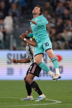 Turin, Italy, 19th April 2026. Federico Bernardeschi of Bologna FC leaps for an aerial ball with Gleison Bremer of Juventus, with the Bologna forward picking up an injury upon landing, during the Juventus vs Bologna Serie A match at Allianz Stadium, Turin. Picture credit should read: Jonathan Moscrop Sportimage EDITORIAL USE ONLY. No use with unauthorised audio, video, data, fixture lists, club league logos or live services. Online in-match use limited to 120 images, no video emulation. No use in betting, games or single club league player publications. SPI_032_JM_JUVE_BOLOGNA SPI-4650-0032