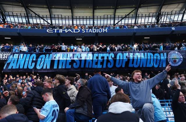 Manchester City fans display a panic on the streets of London banner at the end of the match Manchester City v Arsenal, Premier League, Football, Etihad Stadium, Manchester, UK - 19 Apr 2026Manchester Etihad Stadium United Kingdom EDITORIAL USE ONLY No use with unauthorised audio, video, data, fixture lists, club league logos or live services. Online in-match use limited to 120 images, no video emulation. No use in betting, games or single club league player publications.  Copyright: xMattxWest Shutterstockx 16836204dc