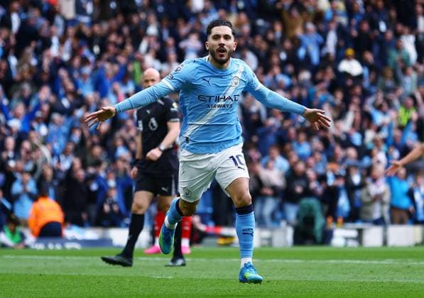 Rayan Cherki of Manchester City celebrates scoring the opening goal Manchester City v Arsenal, Premier League, Football, Etihad Stadium, Manchester, UK - 19 Apr 2026Manchester Etihad Stadium United Kingdom EDITORIAL USE ONLY No use with unauthorised audio, video, data, fixture lists, club league logos or live services. Online in-match use limited to 120 images, no video emulation. No use in betting, games or single club league player publications.  Copyright: xMattxWest Shutterstockx 16836204dg