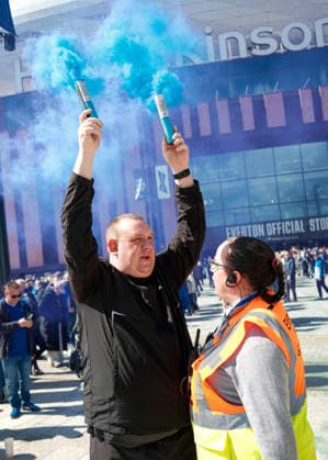 Everton v Liverpool 19 April 2026, Liverpool - Premier League Football - Everton v Liverpool - A man holds up flares and is asked to stop by a steward - Photo: Jacques Feeney Offside. Liverpool UK Copyright: xJacquesxFeeneyx xOffsidexOffside