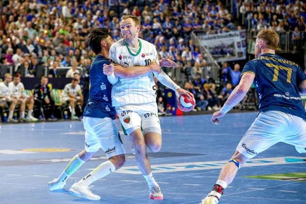 19.04.2026, xsscx, Handball, DHB-Pokal Lidl Final4, Finale, Füchse Berlin - Bergischer HC, Saison 2025 2026 Herren, Lanxess Arena, Köln: Belal Ibrahim Massoud (Bergischer HC 20) im Zweikampf gegen Mathias Gidsel (Füchse Berlin 19) Photo: xSandraxScherningxPressefotoKochx Nordrhein-Westfalen Deutschland