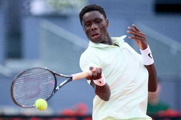 Mutua Madrid Open - Day One Moise Kouame of France plays a forehand against Patrick Kypson of United States during the MenÕs Singles First Round Qualifying match on day one of the Mutua Madrid Open at Caja Magica on April 20, 2026, in Madrid, Spain. Madrid Caja Magica Madrid Spain RL_MMO2K26_000110 Copyright: xRicardoxLarreinax