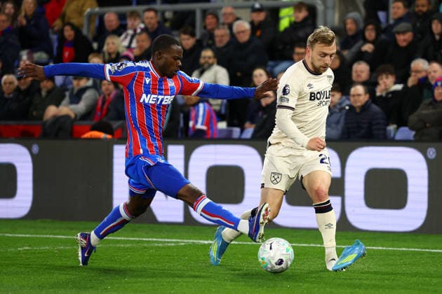 London, England, 20th April 2026. Tyrick Mitchell of Crystal Palace and Jarrod Bowen of West Ham United challenge for the ball during the Crystal Palace vs West Ham United Premier League match at Selhurst Park, London. Picture credit should read: Paul Terry Sportimage EDITORIAL USE ONLY. No use with unauthorised audio, video, data, fixture lists, club league logos or live services. Online in-match use limited to 120 images, no video emulation. No use in betting, games or single club league player publications. SPI_019_PT_Crystal_Palace_West_Ham SPI-4705-0019