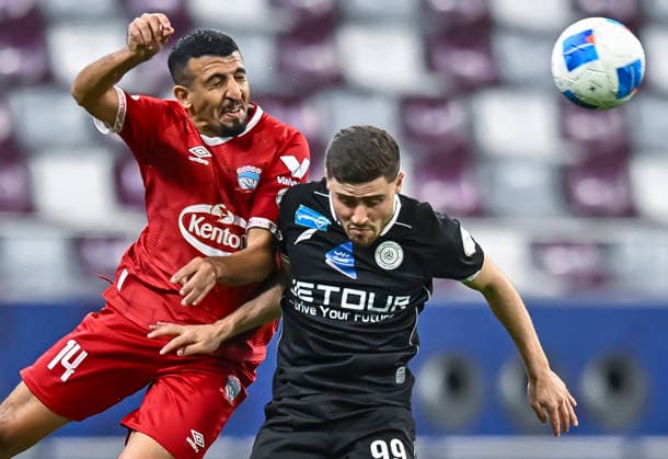 Fußball, Gulf Club CL, Al-Shabab - Zakho SC Zakho vs Al-Shabab AGCFF Gulf Club Champions League Semi-Final Amjed Kadhim(L) of Zakho and Ali Ahmed Azaizeh of Al-Shabab in action during the AGCFF Gulf Club Champions League Semi-Final football match between IraqÕs Zakho and Saudi ArabiaÕs Al-Shabab at Khalifa International Stadium in Doha, Qatar, on April 19, 2026. DOHA Qatar Copyright: xNOUSHADx
