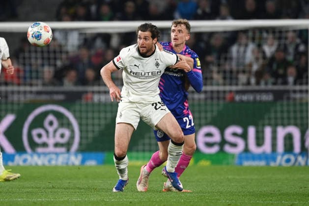 Joe Scally (Borussia Moenchengladbach), Nikolas Veratschnig (Mainz 05), v.li. 19.04.2026, Fussball 1. Bundesliga, Saison 2025 2026, 30. Spieltag, Borussia Mönchengladbach - FSV Mainz 05 1:1 DFL regulations prohibit any use of photographs as image sequences and or quasi-video Moenchengladbach Borussia Park Nordrhein Westfalen Deutschland *** Joe Scally Borussia Moenchengladbach , Nikolas Veratschnig Mainz 05 , v li 19 04 2026, Fußball 1 Bundesliga, Saison 2025 2026, 30 Spieltag, Borussia Mönchengladbach FSV Mainz 05 1 1 DFL regulations prohibit any use of photographs as image sequences and or quasi video Moenchengladbach Borussia Park Nordrhein Westfalen Germany Team2