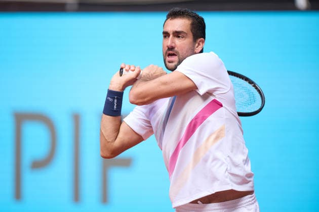 Mutua Madrid Open - Day Three Marin Cilic of Croatia plays a backhand against Zizou Bergs of Belgium during the MenÕs Singles match on day three of the Mutua Madrid Open at Caja Magica on April 22, 2026, in Madrid, Spain. Madrid Caja Magica Madrid Spain RL_MMO2K26_000397 Copyright: xRicardoxLarreinax