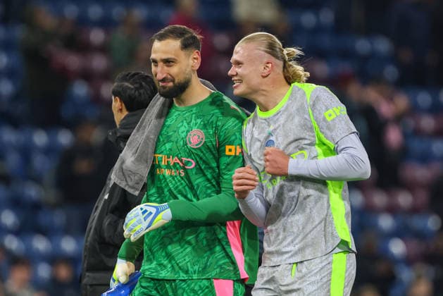 22nd April 2026; Turf Moor, Burnley, Lancashire, England; Premier League Football, Burnley versus Manchester City; Erling Haaland of Manchester City and Gianluigi Donnarumma of Manchester City following Manchester City& x2019;s 1-0 victory AidanxHunter