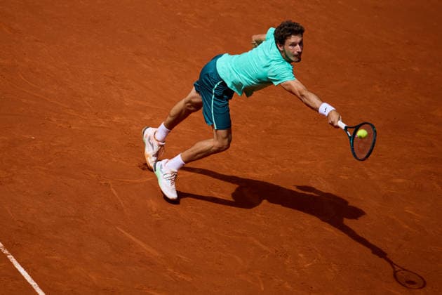 Mutua Madrid Open - Day Four Pablo Carreno of Spain plays a backhand against Marton Fucsovics of Hungary during the MenÕs Singles match on day four of the Mutua Madrid Open at Caja Magica on April 23, 2026, in Madrid, Spain. Madrid Caja Magica Madrid Spain RL_MMO2K26_000711 Copyright: xRicardoxLarreinax