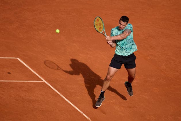 Mutua Madrid Open - Day Four Camilo Ugo Carabelli of Argentina plays a backhand against Gael Monfils of France during the MenÕs Singles match on day four of the Mutua Madrid Open at Caja Magica on April 23, 2026, in Madrid, Spain. Madrid Caja Magica Madrid Spain RL_MMO2K26_000841 Copyright: xRicardoxLarreinax