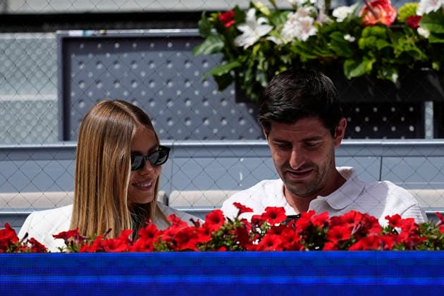 April 23, 2026, Madrid, Madrid, Spain: Thibaut Courtois and Mishel Gerzig are seen during the match between Iga Swiatek of Poland and Daria Snigur of Ukraine during the Mutua Madrid Open 2026, ATP, Tennis Herren Masters 1000 and WTA, Tennis Damen 1000, at La Caja Magica on April 23, 2026 in Madrid, Spain. Madrid Spain - ZUMAa181 20260423_zaa_a181_316 Copyright: xOscarxJ.xBarrosox