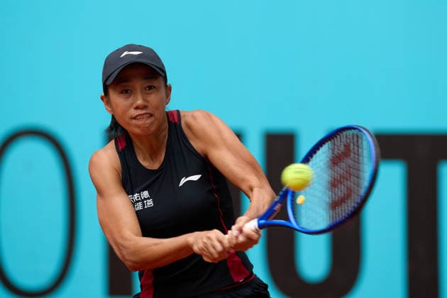 (260424) -- MADRID, April 24, 2026 -- Zhang Shuai hits a return during the women s singles round of 64 match between Zhang Shuai of China and Anastasia Potapova of Austria at the 2026 Madrid Open tennis tournament in Madrid, Spain, on April 24, 2026. ) (SP)SPAIN-MADRID-TENNIS-MADRID OPEN-WOMEN S SINGLES MengxDingbo 