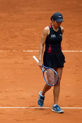 (260424) -- MADRID, April 24, 2026 -- Zhang Shuai reacts during the women s singles round of 64 match between Zhang Shuai of China and Anastasia Potapova of Austria at the 2026 Madrid Open tennis tournament in Madrid, Spain, on April 24, 2026. ) (SP)SPAIN-MADRID-TENNIS-MADRID OPEN-WOMEN S SINGLES MengxDingbo 