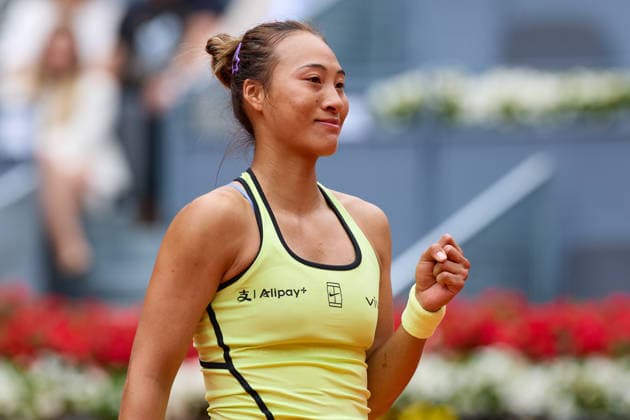 (260424) -- MADRID, April 24, 2026 -- Zheng Qinwen celebrates after winning the women s singles round of 64 match between Zheng Qinwen of China and Sofia Kenin of the United States at the 2026 Madrid Open tennis tournament in Madrid, Spain, on April 24, 2026. ) (SP)SPAIN-MADRID-TENNIS-MADRID OPEN-WOMEN S SINGLES MengxDingbo 