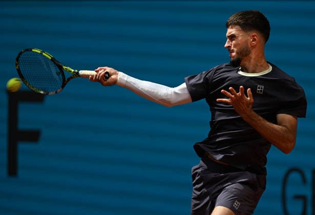 (260425) -- MADRID, April 25, 2026 -- Dino Prizmic hits a return during the men s singles round of 64 match between Dino Prizmic of Croatia and Ben Shelton of the United States at the 2026 Madrid Open tennis tournament in Madrid, Spain, on April 24, 2026. ) (SP)SPAIN-MADRID-TENNIS-MADRID OPEN-MEN S SINGLES ChengxMin 