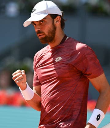 (260425) -- MADRID, April 25, 2026 -- Benjamin Bonzi of France celebrates a point during the men s singles round of 64 match between Jannik Sinner of Italy and Benjamin Bonzi of France in Madrid, Spain, on April 24, 2026. ) (SP)SPAIN-MADRID-TENNIS-MADRID OPEN-MEN S SINGLES ChengxMin 