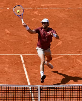 (260425) -- MADRID, April 25, 2026 -- Benjamin Bonzi of France hits a return during the men s singles round of 64 match between Jannik Sinner of Italy and Benjamin Bonzi of France in Madrid, Spain, on April 24, 2026. ) (SP)SPAIN-MADRID-TENNIS-MADRID OPEN-MEN S SINGLES ChengxMin 