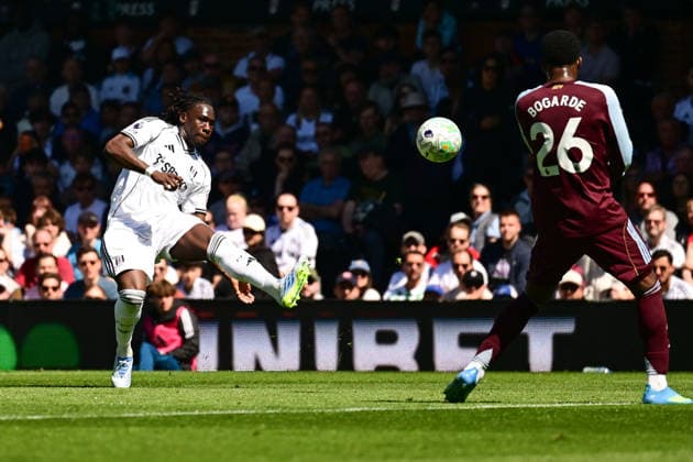 Fulham v Aston Villa, Premier League Fulham defender Calvin Bassey (3) crosses under pressure from Aston Villa midfielder Lamare Bogarde (26) during the Premier League match between Fulham and Aston Villa at Craven Cottage, London, UK on 25 April 2026. London Craven Cottage Greater London UK Editorial use only DataCo restrictions apply See www.football-dataco.com , Copyright: xDennisxGoodwinx PSI-24149-0031