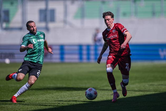 25.04.2026, Fussball, 2. Bundesliga, 31. Spieltag Saison 2025 2026, Preußen Münster - DSC Arminia Bielefeld, Rico Preißinger (Preußen Münster), Jannik Rochelt (DSC Arminia Bielefeld) xRHR-FOTO TKx
