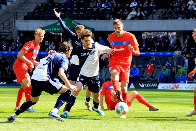 DEU, DFL, 2. FBL, Hertha BSC vs. Holstein Kiel, 25.04.2026, Berliner Olympiastadion, Berlin, DEU, DFL, 2. FBL, Hertha BSC vs. Holstein Kiel, im Bild Dawid Kownacki (Hertha BSC Berlin 9), Pascal Klemens (Hertha BSC Berlin 41), Marko Ivetic (Holstein Kiel 6), DFL - regulations prohibit any use of Photographs as image sequences and or quasi-video