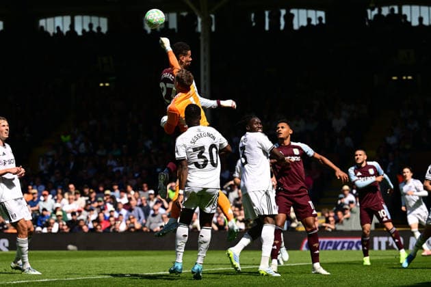Fulham v Aston Villa, Premier League Fulham goalkeeper Bernd Leno (1) makes an important save under pressure from Aston Villa midfielder Morgan Rogers (27) during the Premier League match between Fulham and Aston Villa at Craven Cottage, London, UK on 25 April 2026. London Craven Cottage Greater London UK Editorial use only DataCo restrictions apply See www.football-dataco.com , Copyright: xDennisxGoodwinx PSI-24149-0078