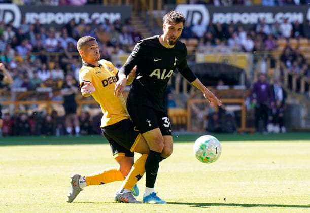 Wolverhampton, England, 25th April 2026. Rodrigo Bentancur of Tottenham (R) is challenged by Joao Gomes of Wolverhampton Wanderers during the Wolverhampton Wanderers vs Tottenham Hotspur Premier League match at Molineux, Wolverhampton. Picture credit should read: Andrew Yates Sportimage EDITORIAL USE ONLY. No use with unauthorised audio, video, data, fixture lists, club league logos or live services. Online in-match use limited to 120 images, no video emulation. No use in betting, games or single club league player publications. SPI_017_AY_WOLVES_SPURS SPI-4731-0017